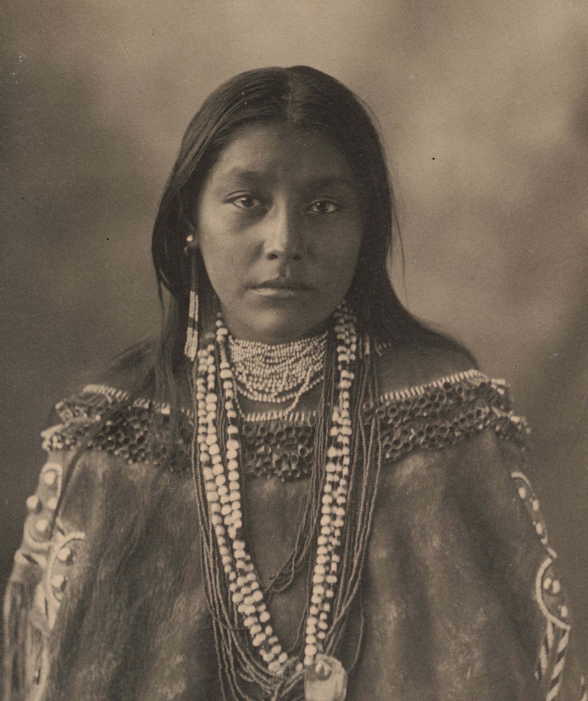 Young native american boy in origin clothes